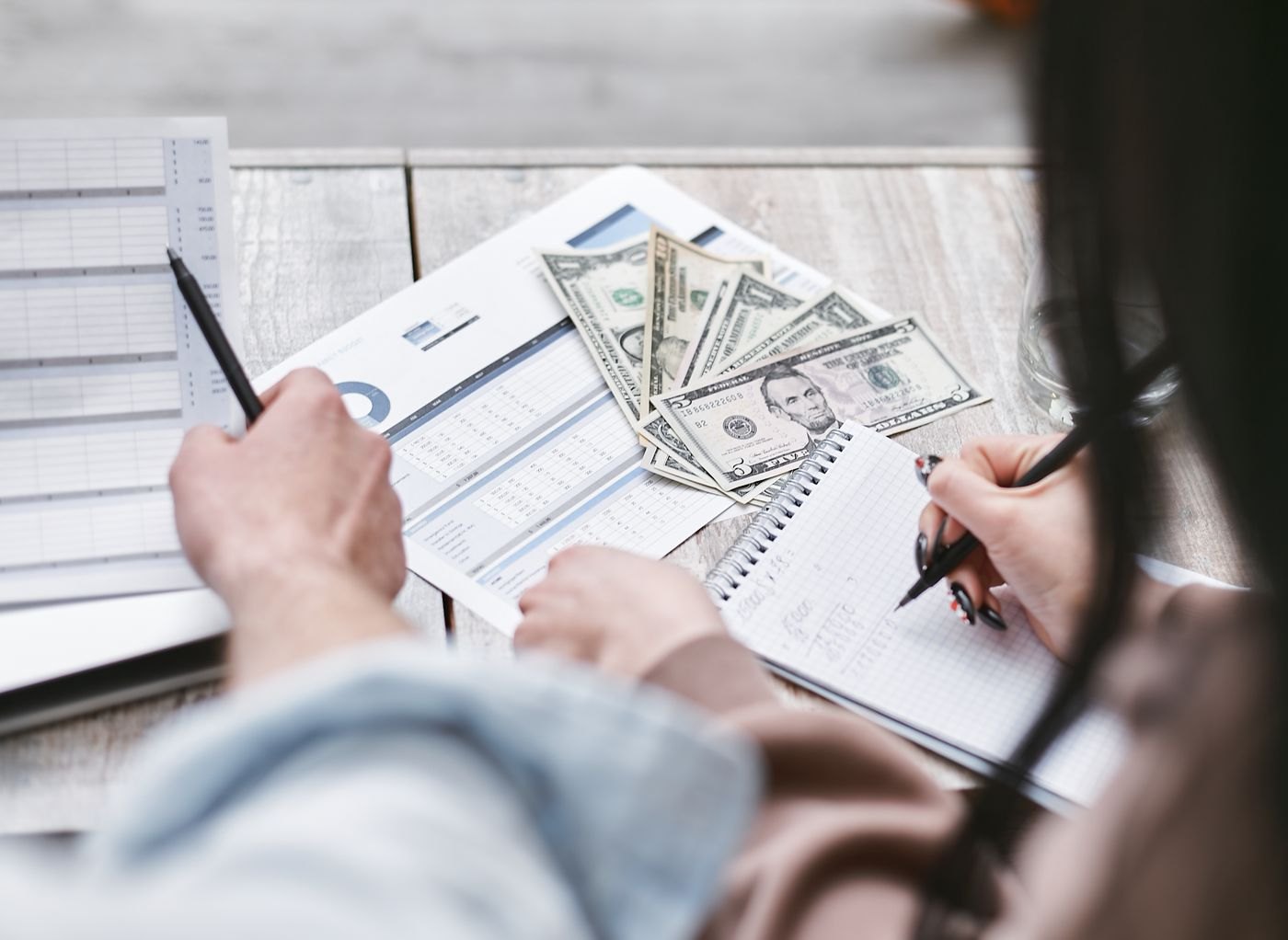 A person reviewing financial figures
