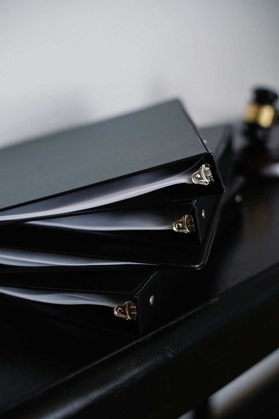 A set of black document folders